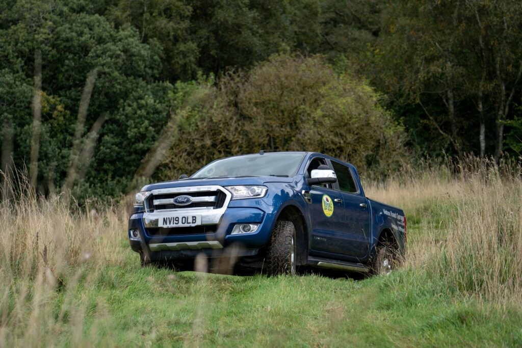 Ford Ranger pick up climbing steep hill off road